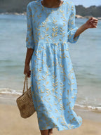 Natalie | Robe midi à motif floral et col rond