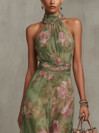 Robe longue en mousseline fleurie verte avec décolleté dos nu - taille M