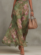 Robe longue en mousseline fleurie verte avec décolleté dos nu - taille L
