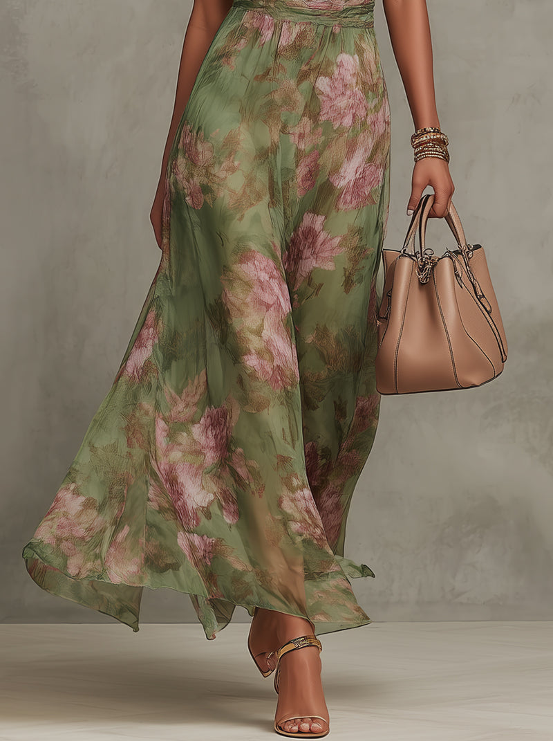 Robe longue en mousseline fleurie verte avec décolleté dos nu - taille L