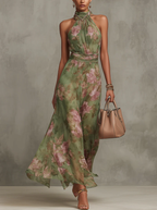 Robe longue en mousseline fleurie verte avec décolleté dos nu - taille XS